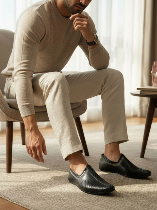 Grey embroidery black juttis for men from the house of seefashion.