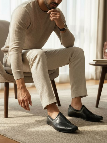 Grey embroidery black juttis for men from the house of seefashion.